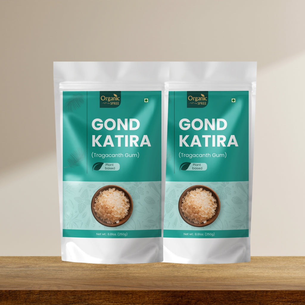 Two packages of Gond Katira on a wooden surface with a beige background