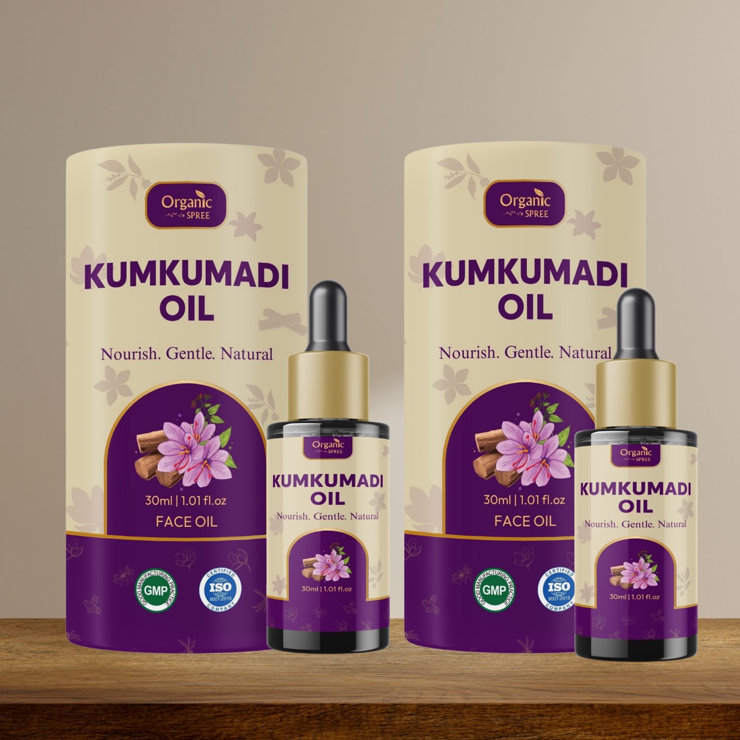 Two bottles of Kumkumadi Oil with their packaging on a wooden surface.